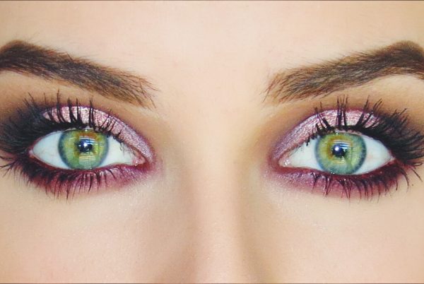 Photo of womens face showing eyebrow, eyelash and makeup trends